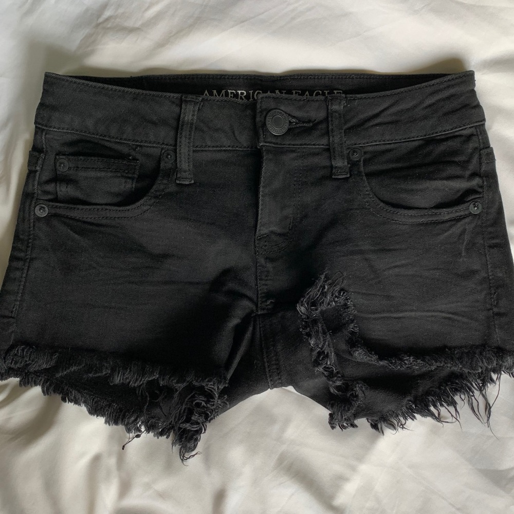 AMERICAN EAGLE frayed black denim shorts